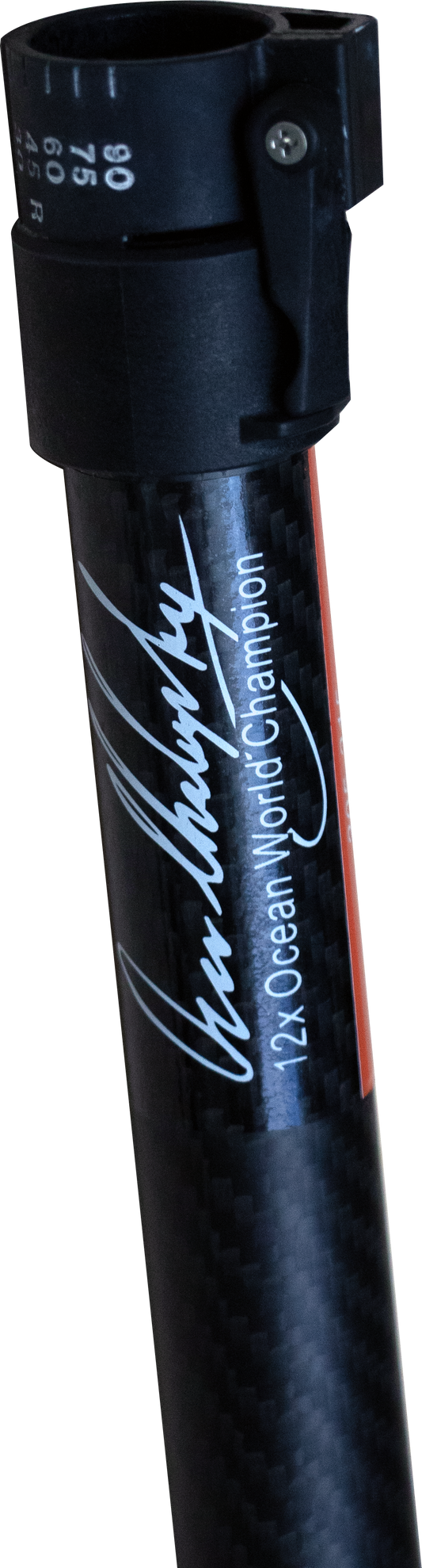 Close-up of a black carbon-fiber paddle shaft with a black plastic clamp at the top, featuring white script text reading Oscar Chalupsky' and '12X Ocean World Champion' printed along the shaft.