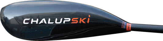 Close-up of a black carbon-fiber ski paddle blade with the brand name 'ChalupSKI' in white and orange